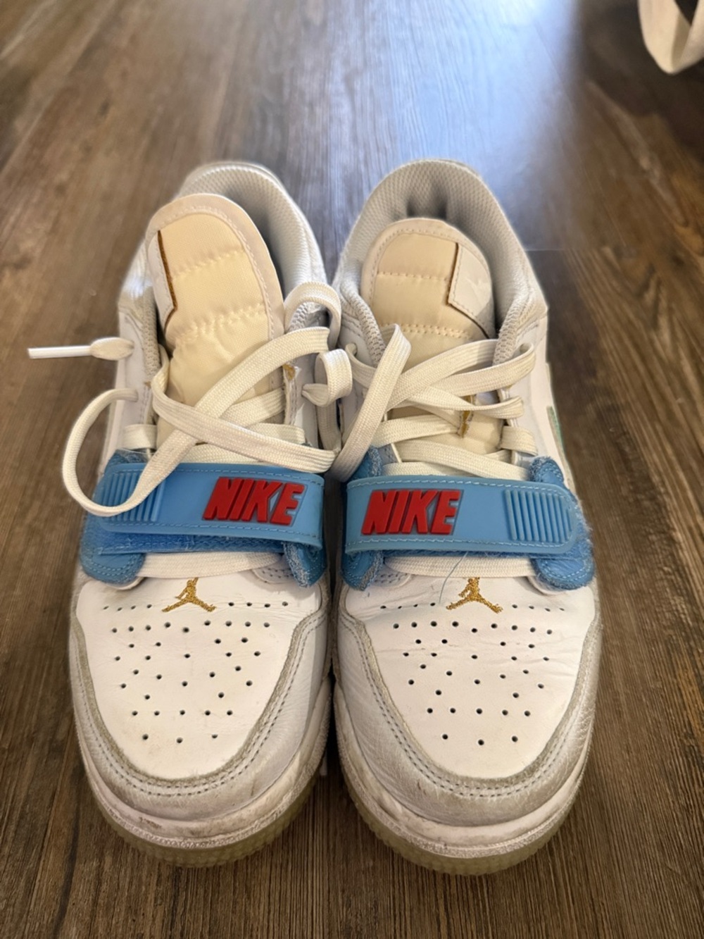 Nike Kids White Sneakers with Blue Strap and Red Logo